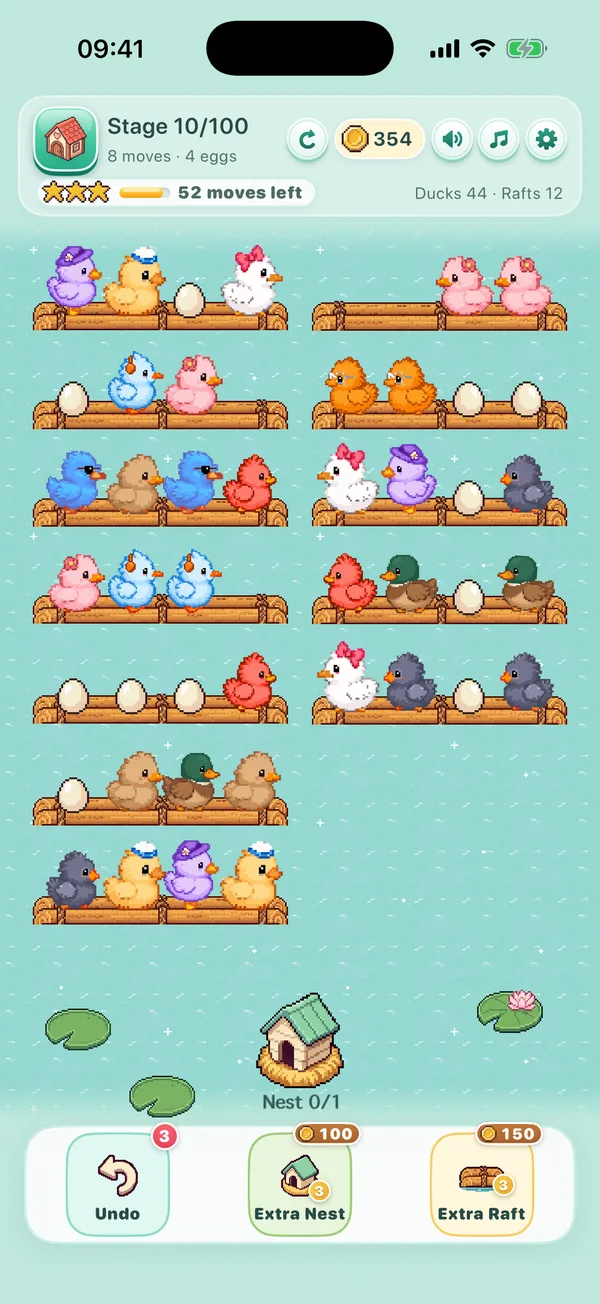 A stage with twelve rafts of colorful ducks and eggs